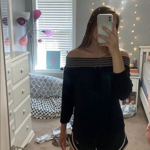Black long sleeve off the shoulder shirt